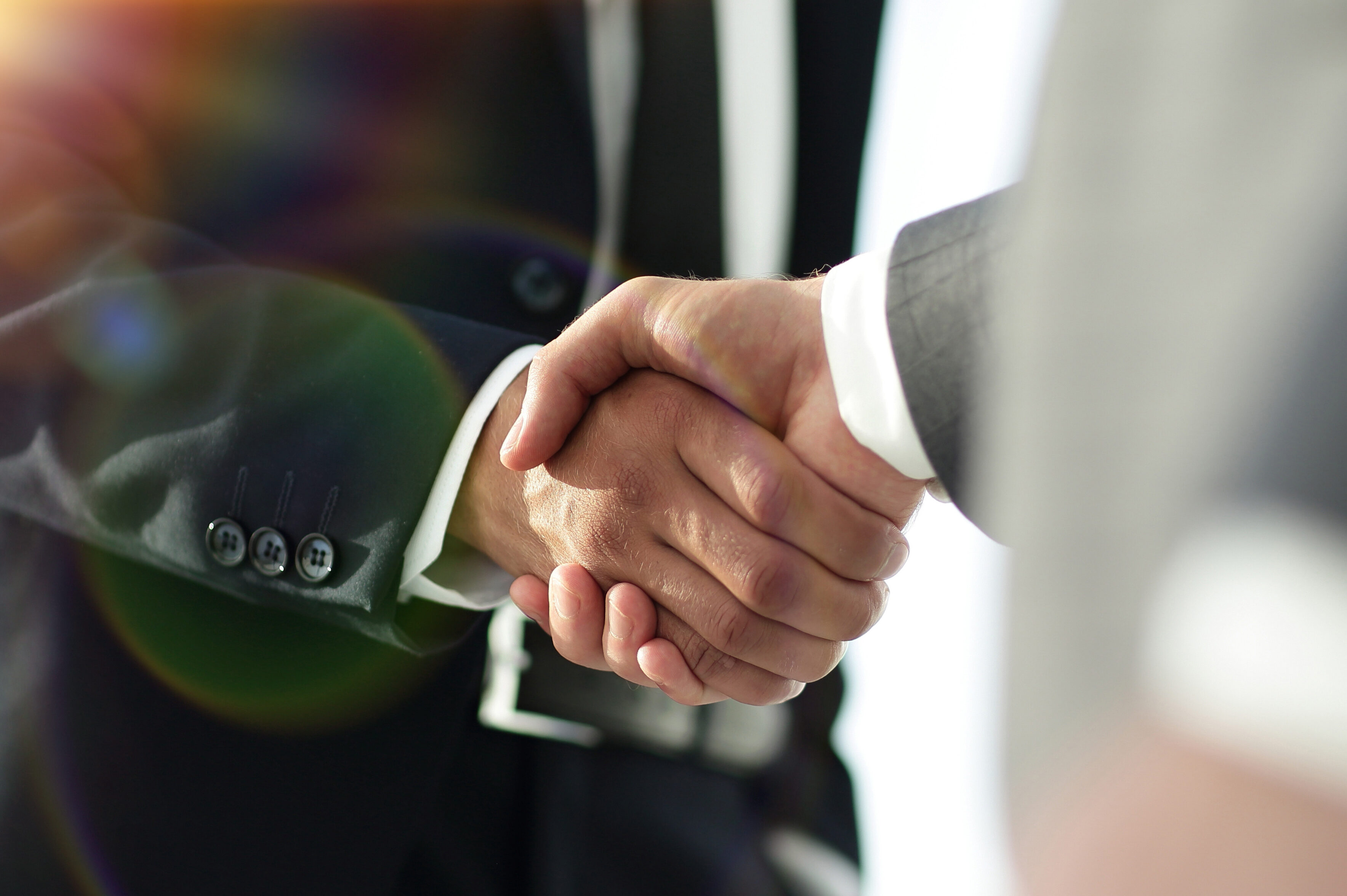 Business men giving a handshake. Business concept